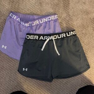 Two pairs of Under Armor shorts in size youth L